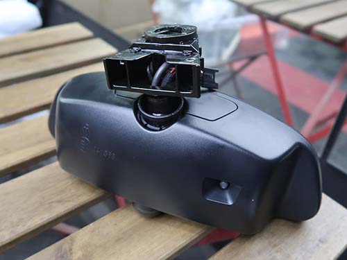 ミラー固定部のツメが折れており固定リングが外れてしまっている状態