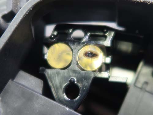 アクリル導光体が茶色く焼損