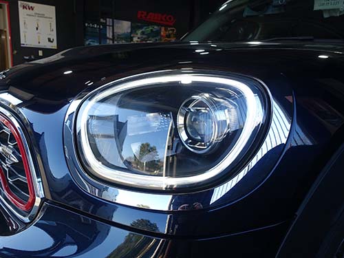 ミニ純正新品のクロームヘッドライトリングへ交換